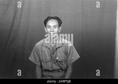 Portrait photos (miscellaneous) [passport photos]  Indonesian man in uniform Date: 1947/01/01 Location: Indonesia, Dutch East Indies Stock Photo