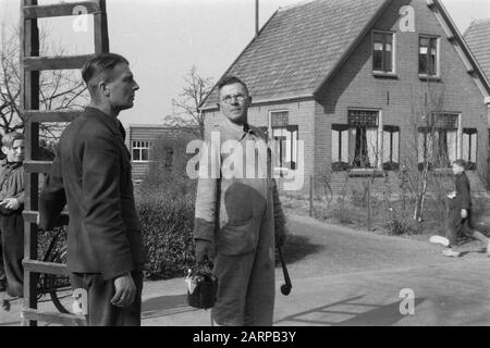 pruning, workers, houses Date: undated Keywords: workers, houses, pruning Stock Photo