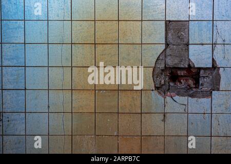scary tile with rust in a dark room Stock Photo