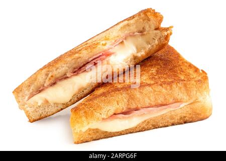 Classic cheese and ham toasted sandwich cut in half isolated on white. Stock Photo