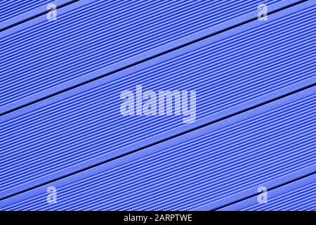 Vinyl siding texture, blue color. Modern plastic wall cladding protective material for houses and small apartment buildings. Wood clapboard imitation Stock Photo