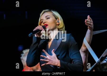 Famous Russian singer Polina Gagarina sings in front of participants in the business forum Stock Photo