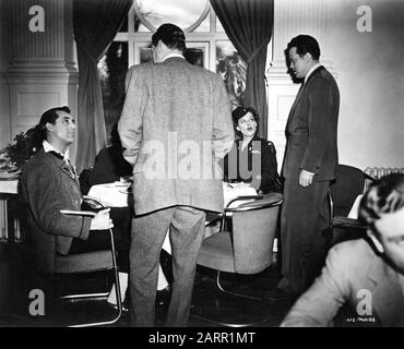 CARY GRANT JOSEPH COTTEN ( back to camera) ANN SHERIDAN and ORSON WELLES at London Film Studios Shepperton Dining Room during filming of THE THIRD MAN 1949 director CAROL REED screenplay GRAHAM GREENE producer ALEXANDER KORDA London Film Productions / British Lion Film Corporation Stock Photo