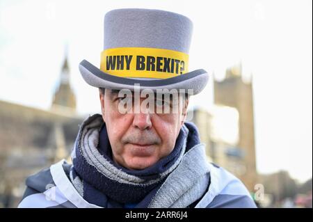 London, UK.  29 January 2020. Steve Bray of SODEM, wearing a hat bearing the text Why Brexit?, joins anti-Brexit protesters in Parliament Square calling on holding the Boris Johnson, Prime Minister, and his government to account during the upcoming Brexit negotiations.  Britain will formerly leave the European Union at 11pm on 31 January.  Credit: Stephen Chung / Alamy Live News Stock Photo