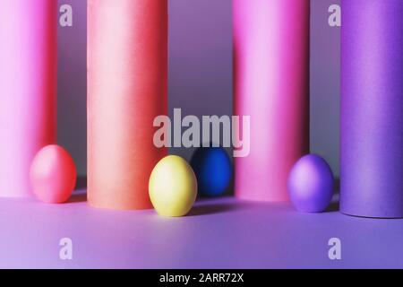 Colored Easter eggs with tubes made from craft paper. Ester concept. Stock Photo