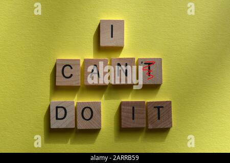 I Can't Do It, with the T crossed out to read I Can Do It. Motivational phrase Stock Photo