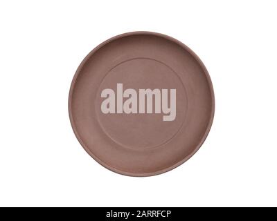 Brown clay plate on white isolated background. Healthy eating concept Stock Photo