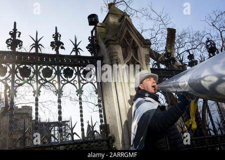 Two days before Brexit Day (the date of 31st January 2020, when the UK legally exits the European Union), infamous Remainer (Mr Brexit) Steve Bray uses his megaphone outside parliament during the weekly Prime Minister's Questions session, in Parliament Square, Westminster, on 29th January 2020, in London, England.