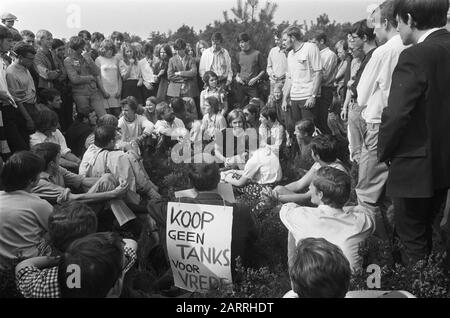 High school students Eindhoven demonstrate against using hei at Oirschot as training ground tanks: demonstrators on the moor with signs/Date: 9 september 1969 Location: Eindhoven , Oirschot Keywords: Schools, demonstrations, training grounds Stock Photo