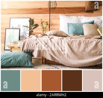 Stylish interior of modern bedroom. Different color patterns Stock Photo