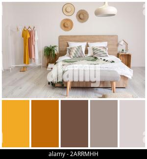 Stylish interior of comfortable bedroom. Different color patterns Stock Photo