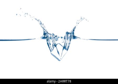 Ice cube splashing on water surface, white background Stock Photo