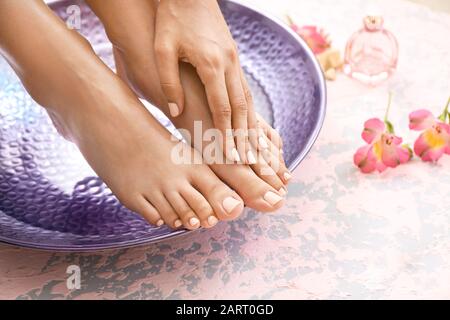 Pedicure dead skin remover foot rasp woman in nail salon Stock Photo - Alamy