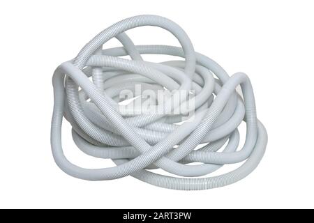 Plastic hose isolated. Close-up of a disorderly bunch of light gray industrial flexible plastic corrugated pipe for electrical cable installations iso Stock Photo