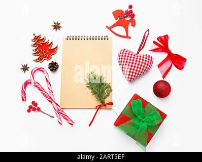 Beautiful Christmas composition with notebook on white background Stock Photo