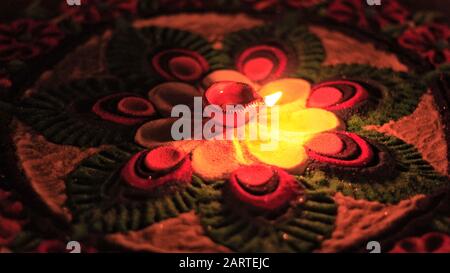 Soil or clay lamp radiating light in dark.This types of lamps are common in india and nepal, especially in Diwali.(Indian Festival). Stock Photo