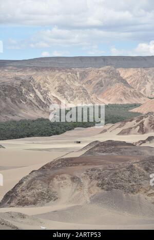 Panoramic views over a river valley in the deserts of Ica, Peru Stock Photo