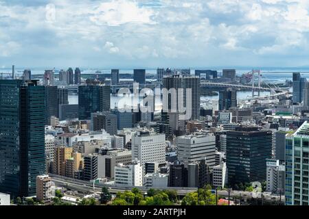 Tokyo cityscape viewed from the Tokyo Tower. In the background is possible to see Rainbow Bridge, Odaiba and Tokyo Bay. Tokyo, Japan, August 2019 Stock Photo