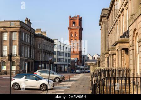 Railway station tower and buildings in Hamilton square, Birkenhead Stock Photo