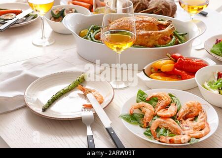 Many dishes served on table for big family dinner Stock Photo