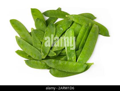 green fresh snow peas with water drops on a white isolated background Stock Photo