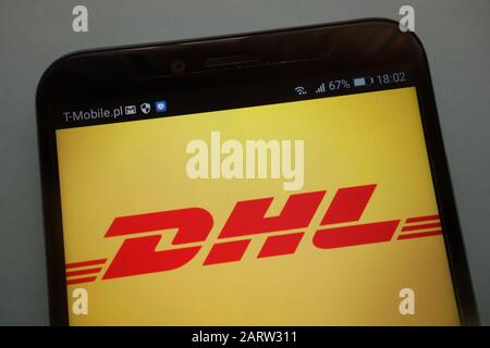 logo of the brand DHL on a modern smartphone Stock Photo