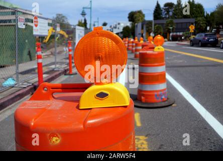 Street with lanes delimited by road separators. Roadworks. Organization of road traffic using traffic bollards. Stock Photo