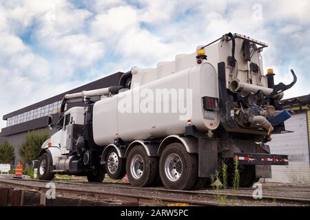 Vacuum Truck and Sewer Cleaner. Truck dedicated for catch basin cleaner. Stock Photo