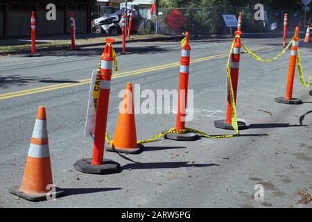 Street with lanes delimited by road separators. Roadworks. Organization of road traffic using traffic bollards. Stock Photo