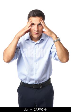 Portrait of handsome young businessman suffering from headache on white background Stock Photo