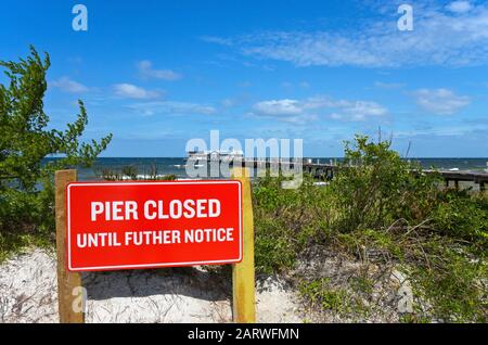 ANNA MARIA, FL - October 2,  2017: Anna Maria Historic Pier is closed after being extensively damaged by Hurricane Irma. Stock Photo