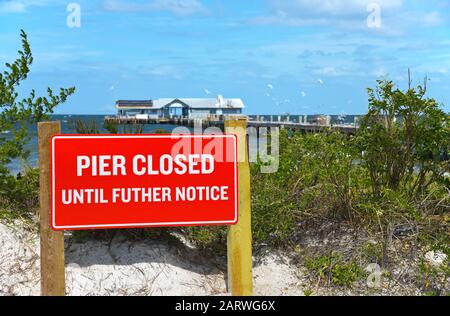 ANNA MARIA, FL - October 2,  2017: Anna Maria Historic Pier is closed after being extensively damaged by Hurricane Irma. Stock Photo