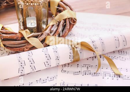 Note sheets and Christmas decor on table Stock Photo