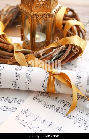 Note sheets and Christmas decor on table Stock Photo