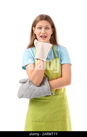 Surprised young woman in apron on white background Stock Photo