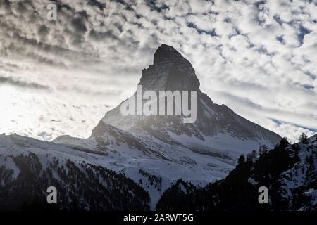 view of Matterhorn through hotel window in Zermatt Stock Photo