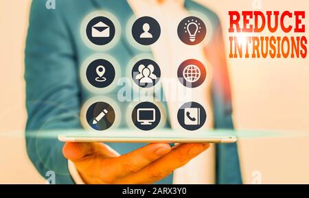 Handwriting text writing Reduce Intrusions. Conceptual photo a strategy to reduce and monitor false alarm rates Stock Photo