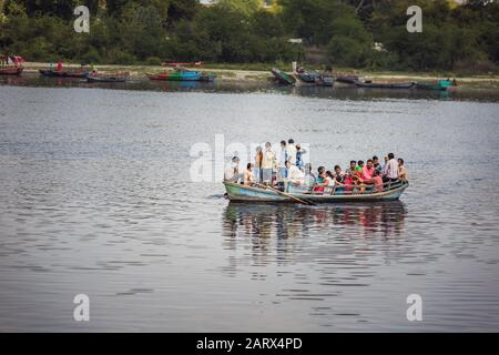 Vrindavan, India - March 12 2017: Indian people in the boat at Vrindavan, India. Stock Photo