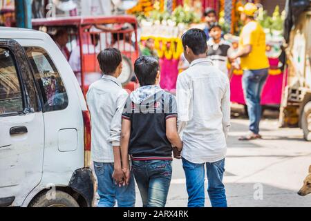 Vrindavan, India - March 12 2017: Indian children holding hands at Vrindavan, India. Stock Photo