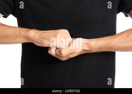 Young deaf mute man using sign language, closeup Stock Photo