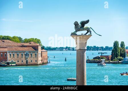 The famous ancient winged lion sculpture on the Piazza San Marco in Venice, Italy. The lion is a symbol of Venice. Stock Photo