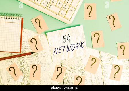 Handwriting text writing 5G Network. Conceptual photo greatly increase the speed and responsiveness of wireless network Writing tools, computer stuff Stock Photo