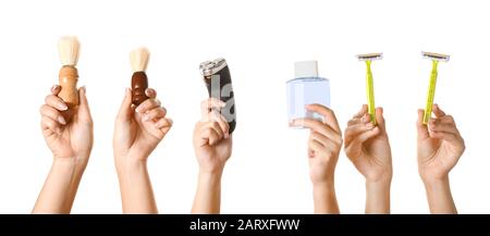 Hands with different tools for shaving on white background Stock Photo