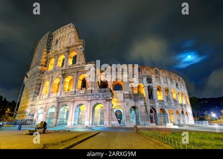 Colosseum (Coliseum) at night in Rome, Italy Stock Photo