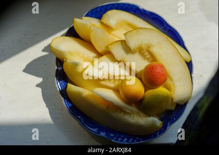 Melon's slices with fresh peach. Melon slices and apricot Stock Photo