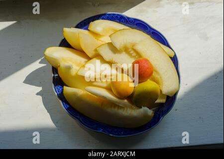Melon's slices with fresh peach. Melon slices and apricot Stock Photo
