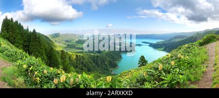 Panorama of the volcanic caldera at Sete Cidades on São Miguel in the Azores. The Azul and Verde lakes show their blue and green waters.
