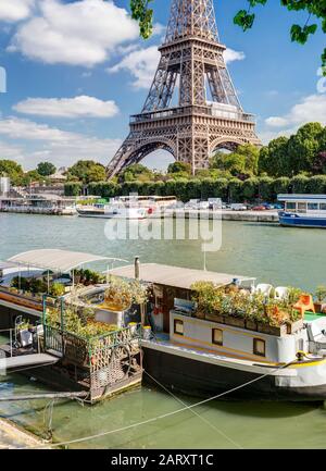 Residential house barge on the Seine near the Eiffel Tower, Paris Stock Photo