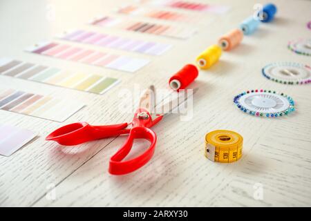 Set of sewing supplies on white table Stock Photo