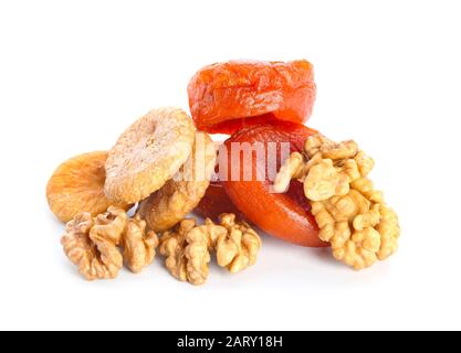 Different dried fruits and nuts on white background Stock Photo